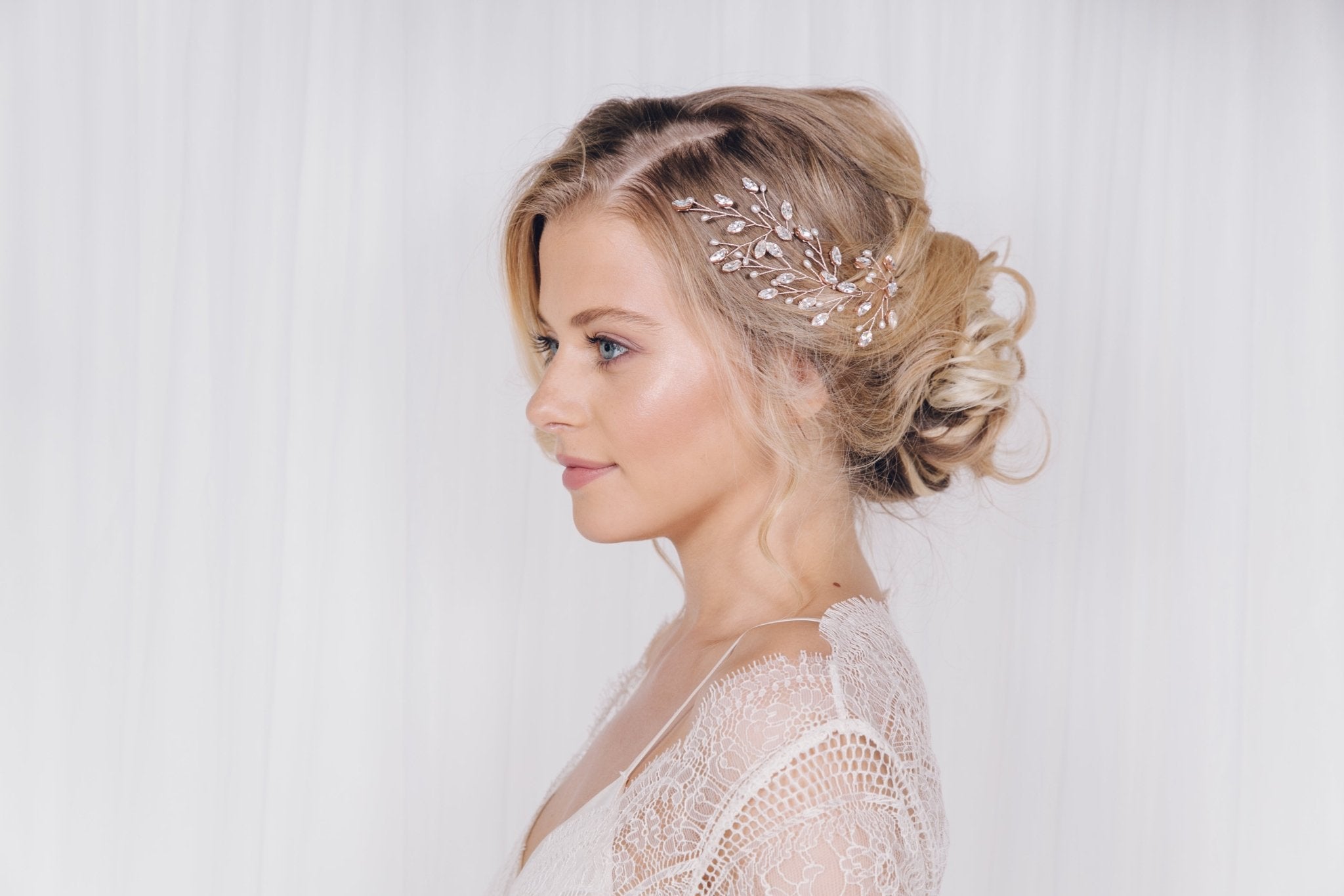 model wears set of three leafy rose gold hair pins