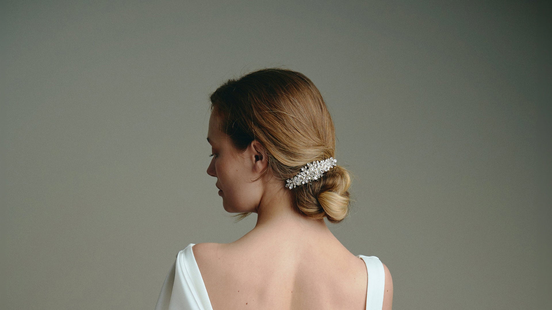 Bridal Hair Combs - model wears a simple celestial crystal and pearl comb