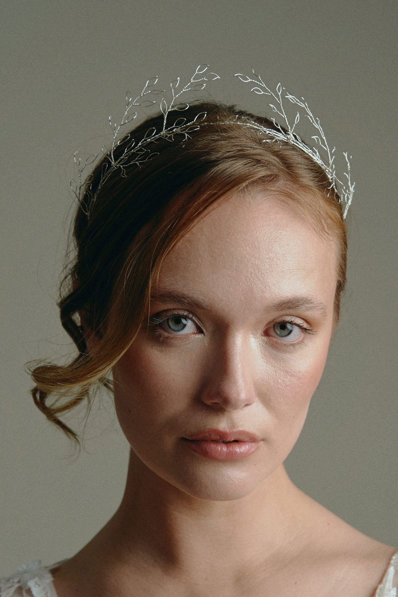 Model wears leaf crown in silver