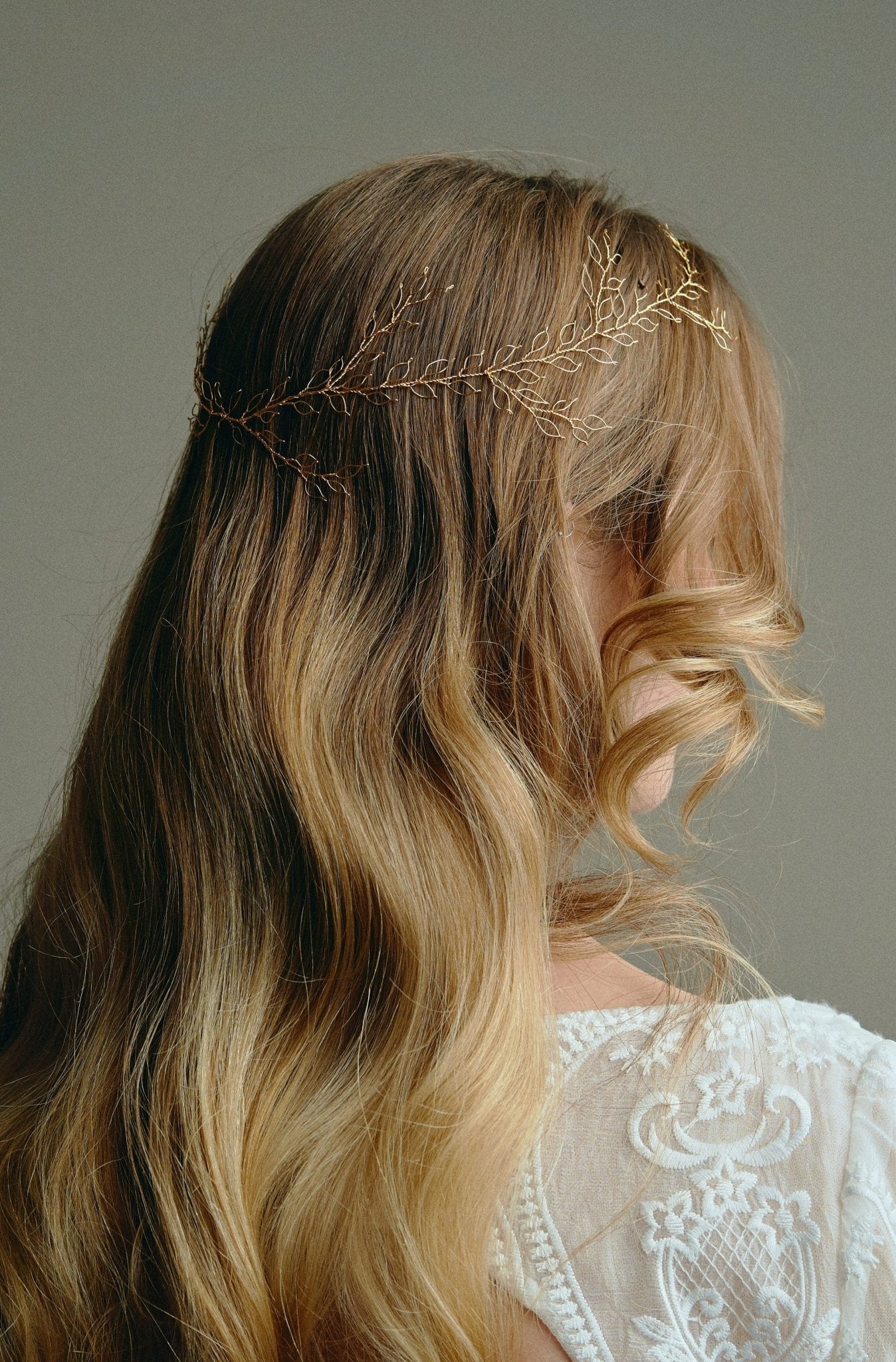 Bridal Hair Vine - model wears long leafy gold bridal hair vine