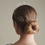 Model wears Amelia Silver Leaf Crown with matching leafy wedding hair pins in the back of her hair