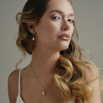 Gold teardrop freshwater pearl earrings with matching necklace