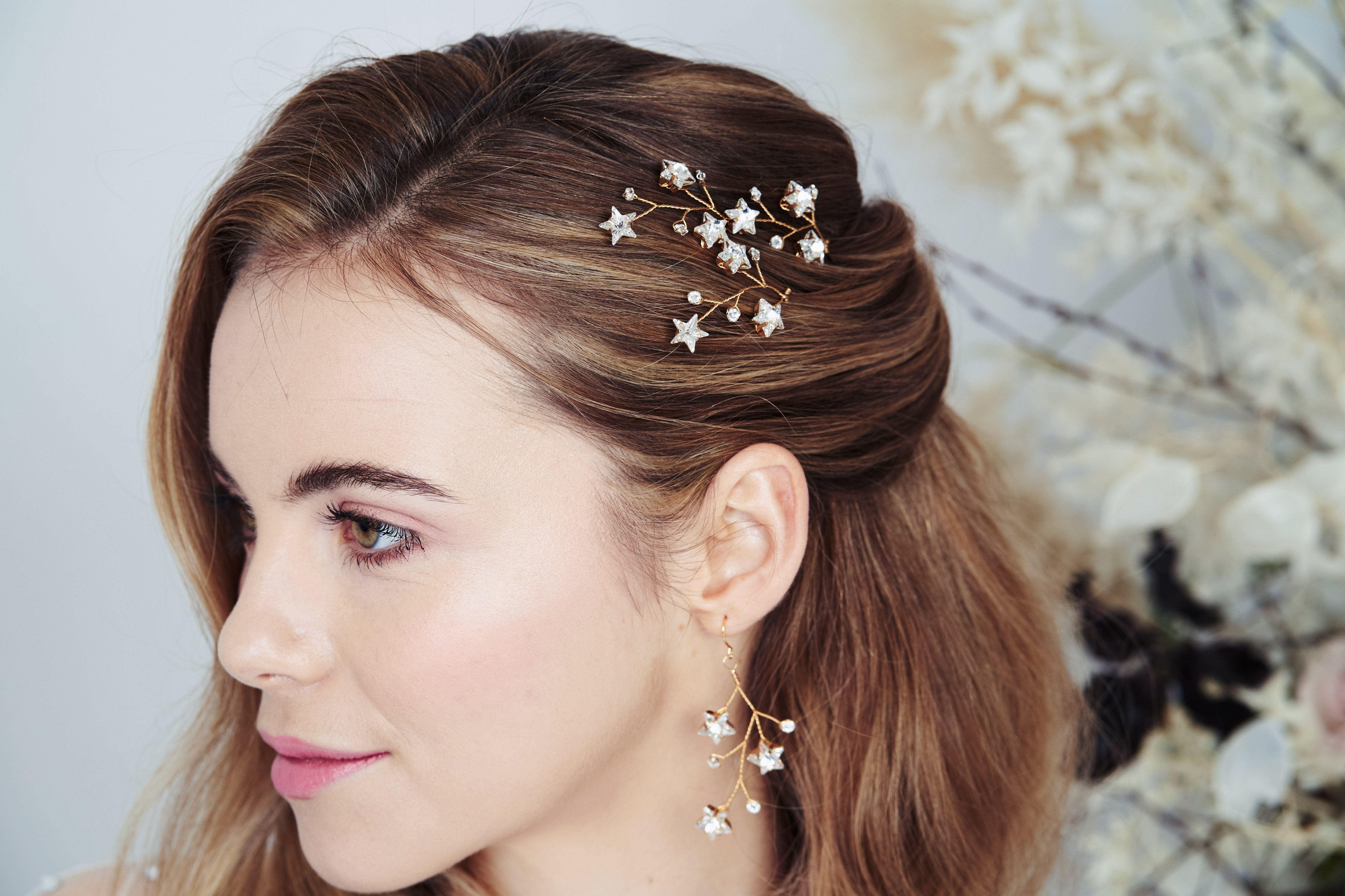 Gold Lunaria Swarovski Crystal star cluster earrings worn with Lunaria hair pins