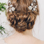 Mirror image pair of silver flower bridal hair combs