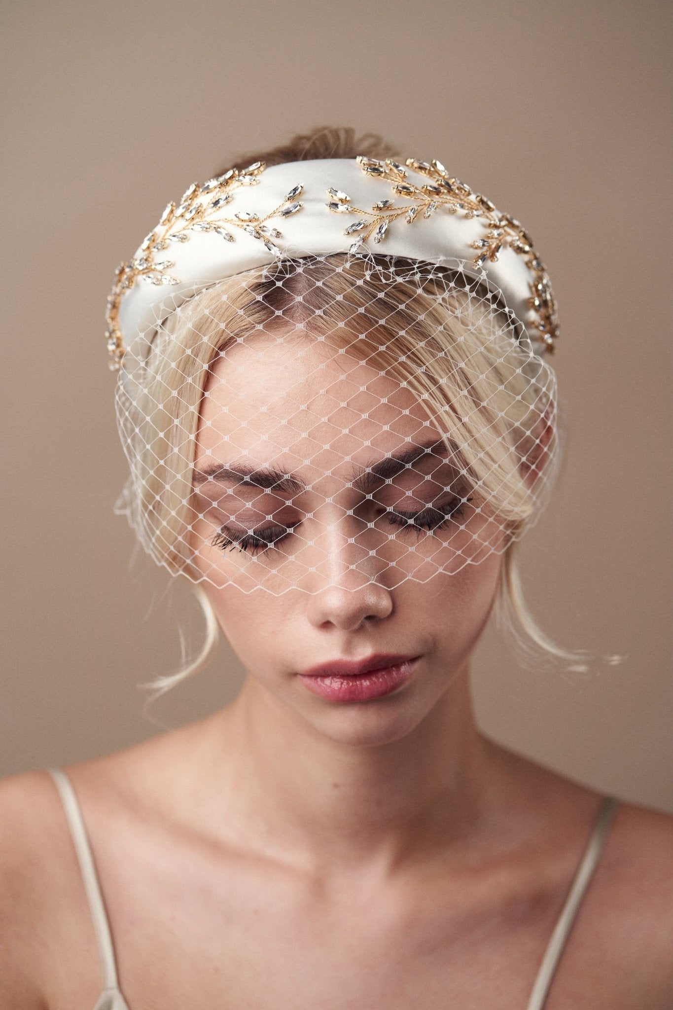 Short birdcage veil styled with Gold and Ivory  crystal padded headband