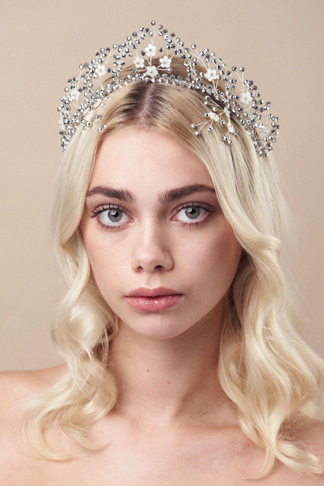 Silver Laboradite floral crystal wedding crown with matching hairpins on blonde model