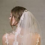Rustic comb worn in above veil with ivory flowers with clear crystals and pearls