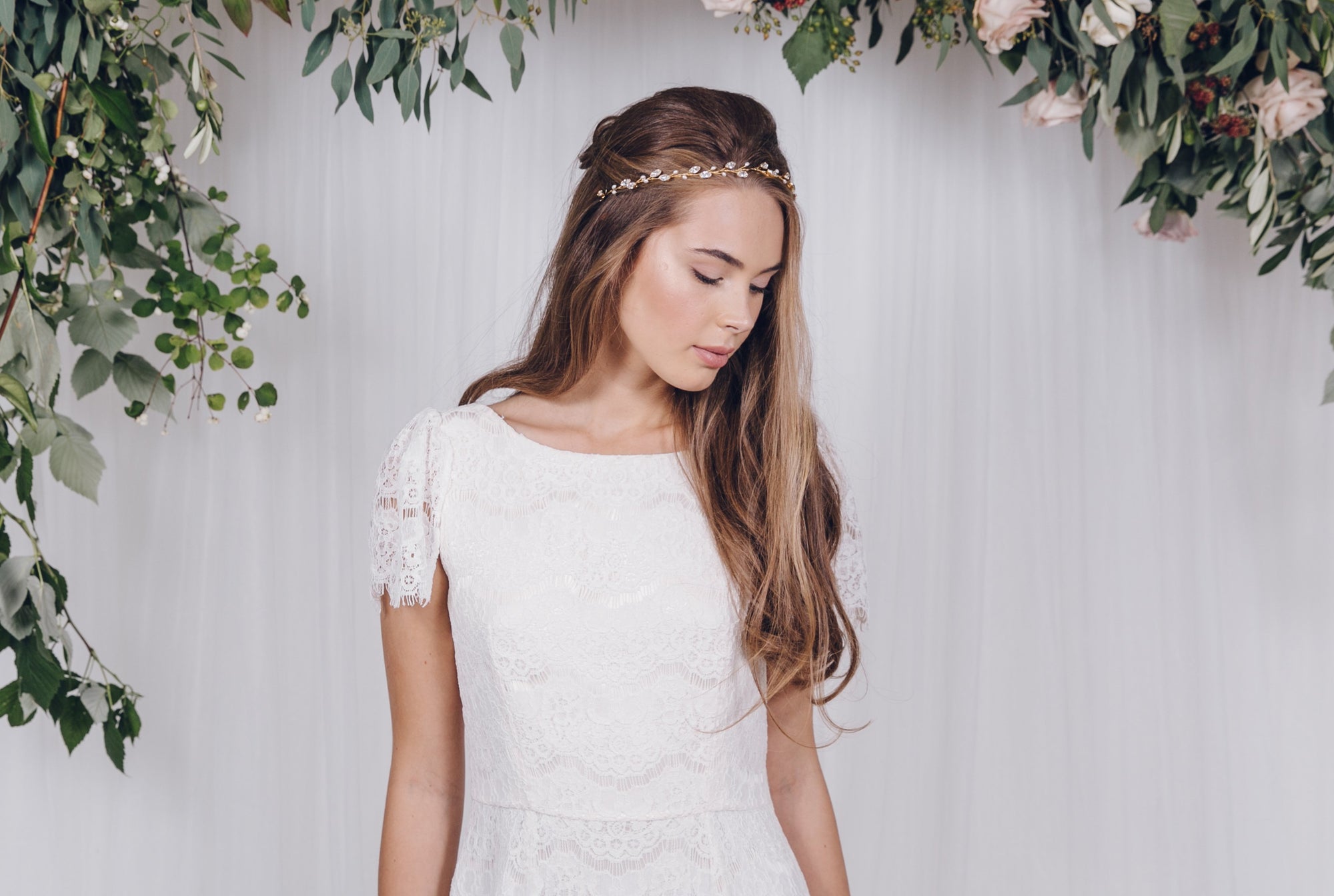 Simple pearl and crystal wedding hair vine for a classic boho bride