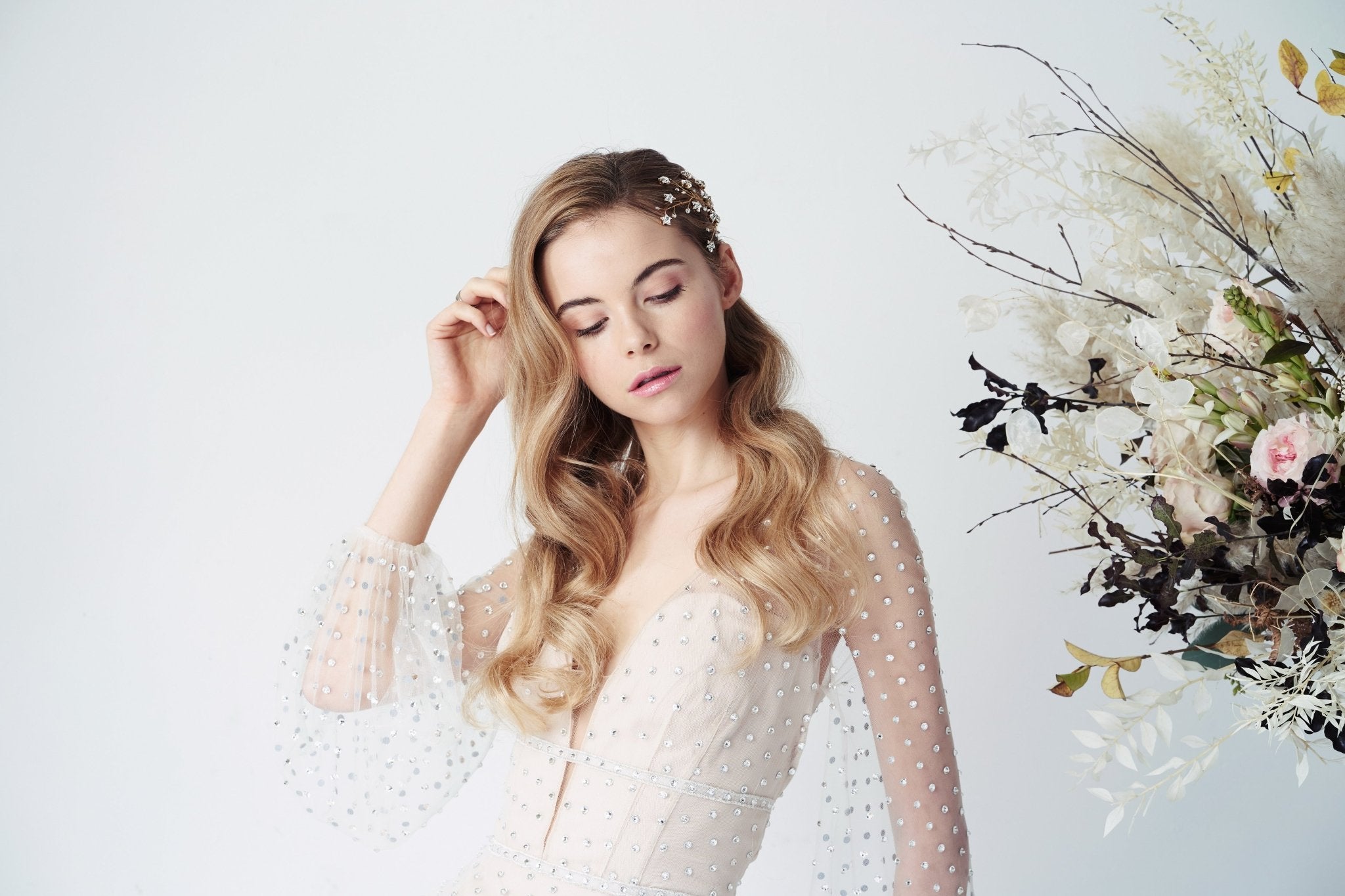 bride with glossy hair on her wedding day