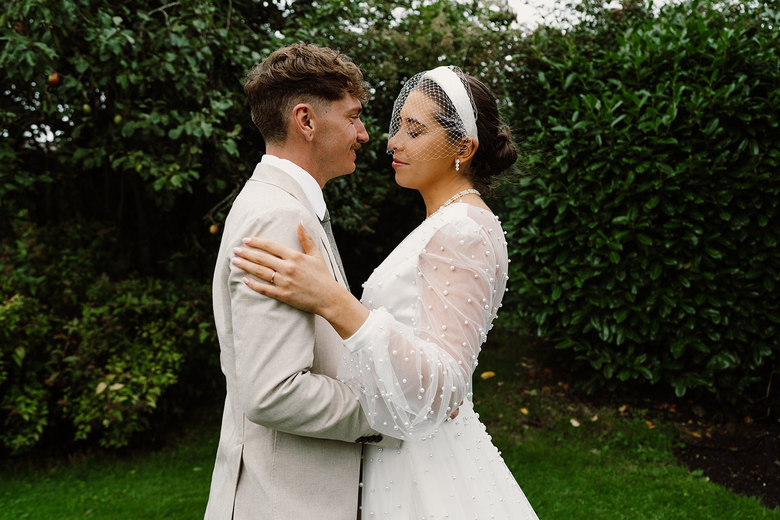 A Birdcage Veil Padded Headband For A Modern Classic Bride