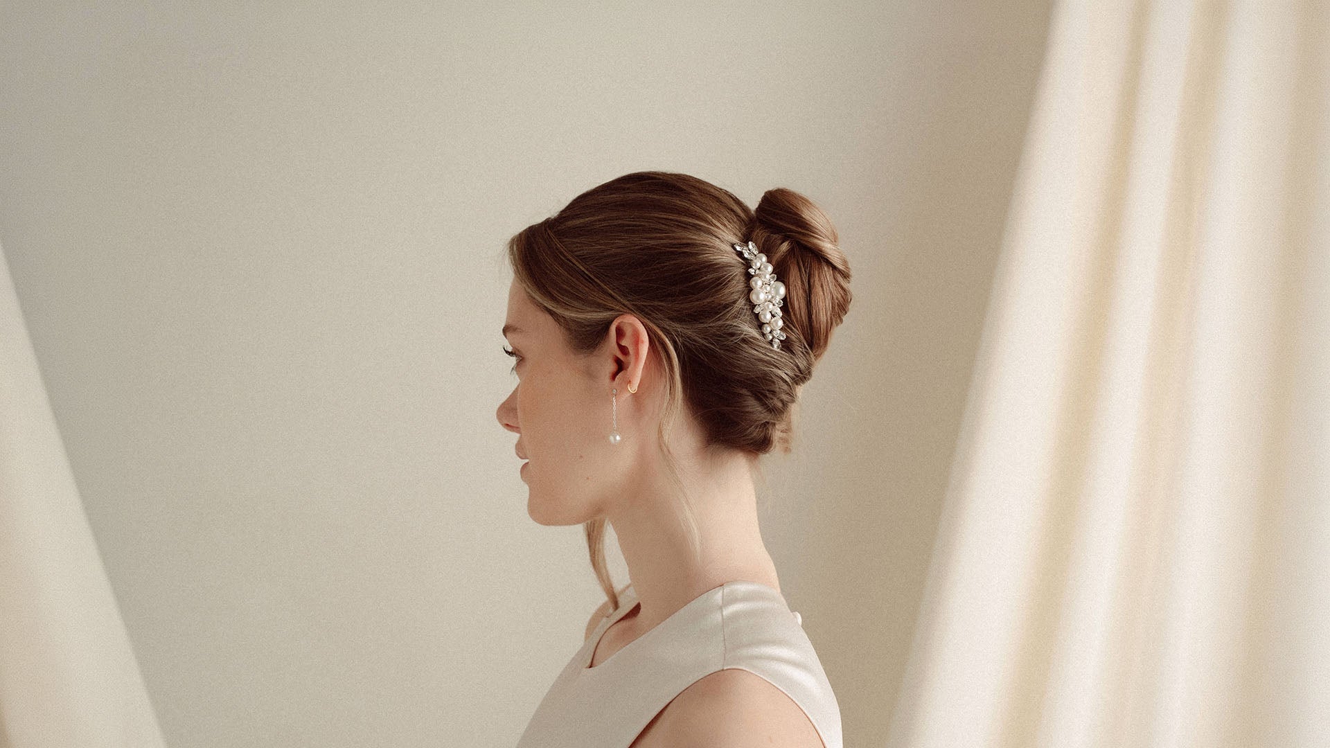 Bridal Hair Combs - model wears a simple celestial crystal and pearl comb