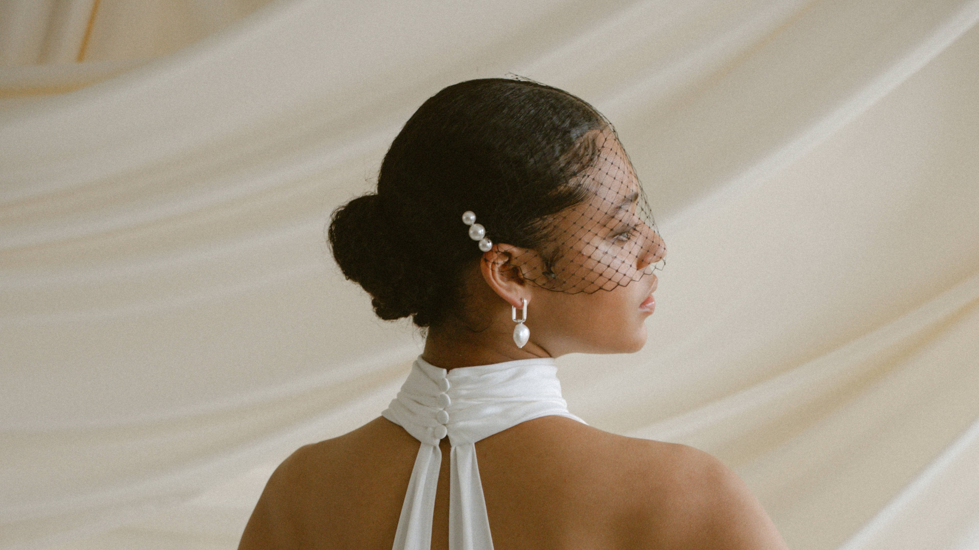 Bridal Hair Combs - model wears a simple celestial crystal and pearl comb