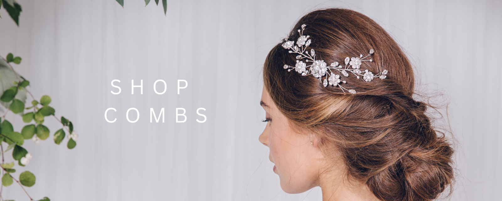 Bride wears mid size floral comb hairvine 