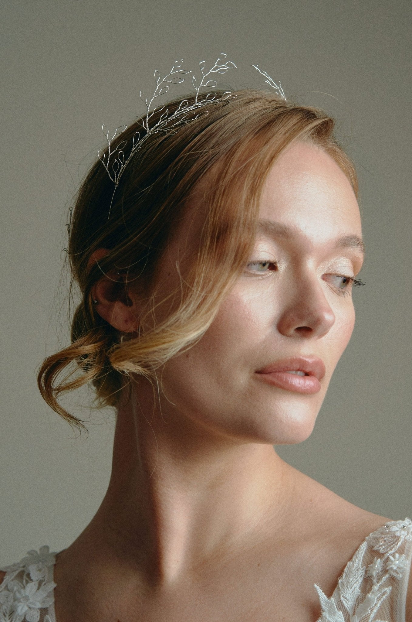 Model wears leaf crown in silver