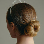 Leafy Wedding Hair Pins - Setof  Four Silver  Hairpins worn by model in the back of a low bun updo 