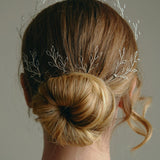 Leafy Wedding Hair Pins - Setof  Four Silver  Hairpins worn by model in the back of a low bun updo 