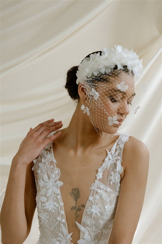 Betsy Ivory Birdcage Veil With 3D Silk Flowers worn with the Florence silk flower padded headband