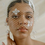 Betsy Ivory Birdcage Veil With 3D Silk Flowers worn with the Esther padded headband