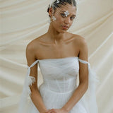 Betsy Ivory Birdcage Veil With 3D Silk Flowers worn with the Esther silk flower padded headband