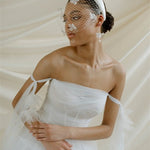 Betsy Ivory Birdcage Veil With 3D Silk Flowers worn with the Esther padded satin headband