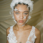 Betsy Ivory Birdcage Veil With 3D Silk Flowers worn with the Florence silk flower padded headband