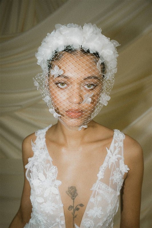 Betsy Ivory Birdcage Veil With 3D Silk Flowers worn with the Florence silk flower padded headband
