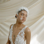 Betsy Ivory Birdcage Veil With 3D Silk Flowers worn with the Florence silk flower padded headband