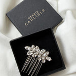 small crystal bridal hair comb in black display box with Debbie Carlisle logo in gold