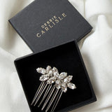 small crystal bridal hair comb in black display box with Debbie Carlisle logo in gold
