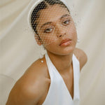 Leena Birdcage Veil with crystal edges styled with the Esther ivory satin padded headband