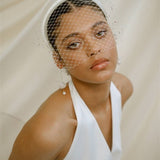 Leena Birdcage Veil with crystal edges styled with the Esther ivory satin padded headband