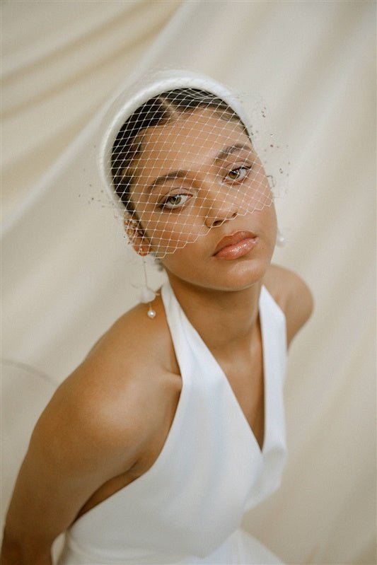 Leena Birdcage Veil with crystal edges styled with the Esther ivory satin padded headband