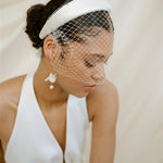 Leena Birdcage Veil with crystal edges styled with the Esther ivory satin padded headband