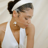 Leena Birdcage Veil with crystal edges styled with the Esther ivory satin padded headband