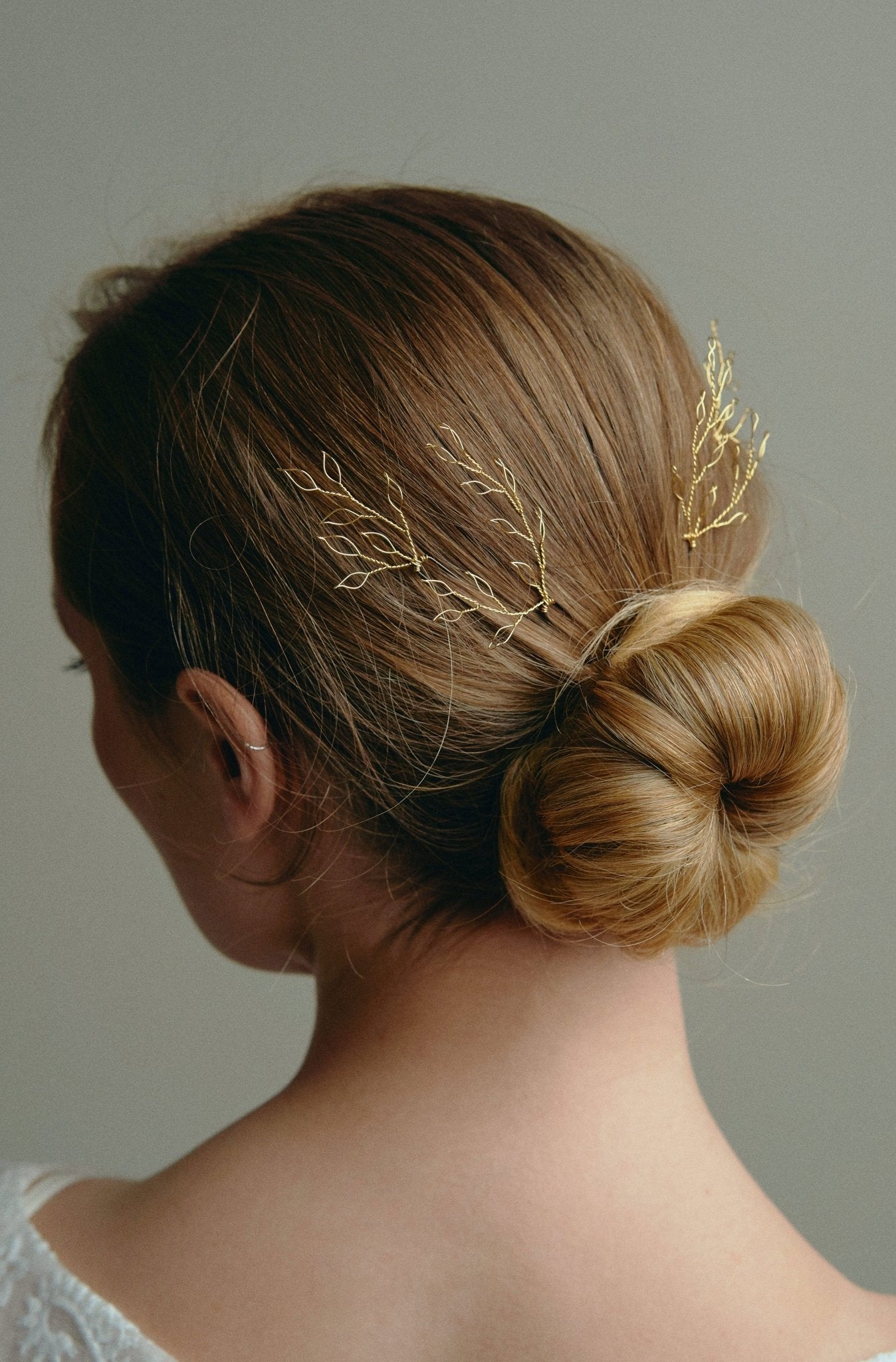 Leafy Wedding Hair Pins - Set of Four  Gold Hairpins worn by model with low bun updo