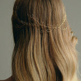 Bridal Hair Vine - model wears long leafy gold bridal hair vine