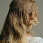 Bridal Hair Vine - model wears long leafy gold bridal hair vine