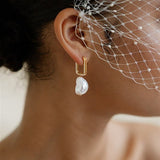 Ora Large Baroque Pearl Sculptural Oblong Hoop Style Earrings