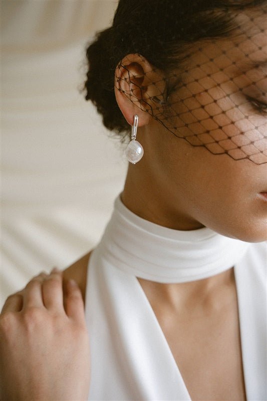 Ora Large Baroque Pearl Sculptural Oblong Hoop Style Earrings