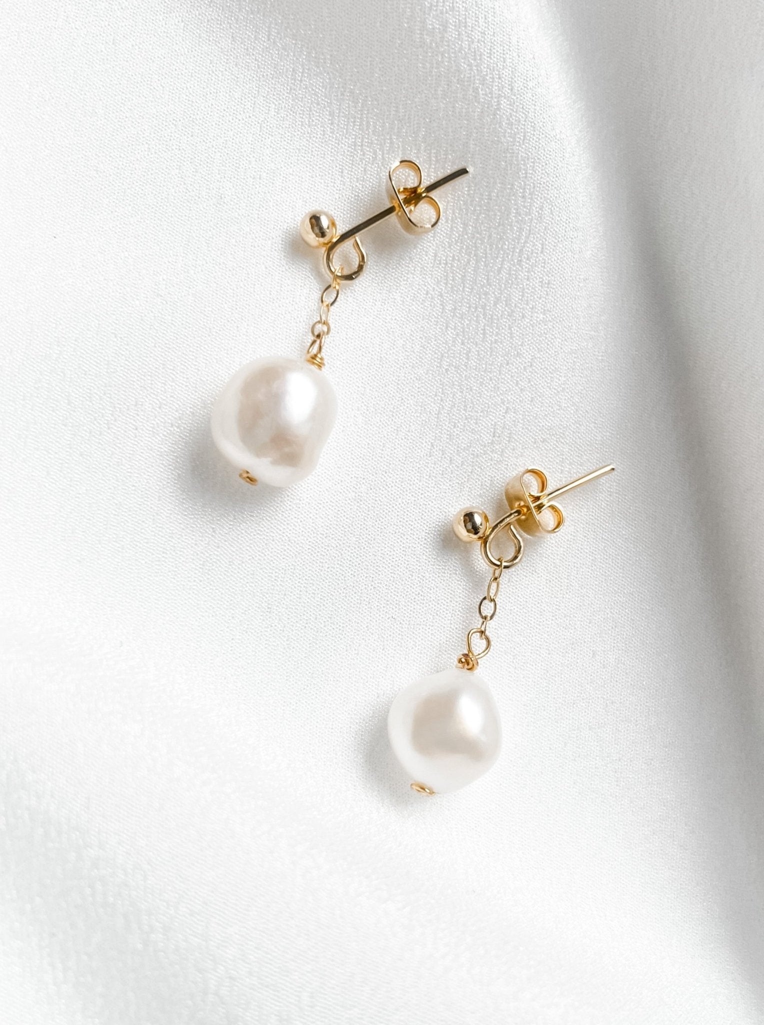 Pippa small drop baroque pearl earrings gold