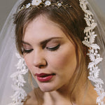 Rustic comb worn in tiara position with ivory flowers with gold crystals