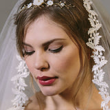 Rustic comb worn in tiara position with ivory flowers with gold crystals