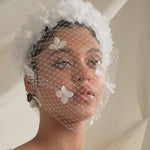 Betsy ivory birdcage veil with cascading silk flowers
