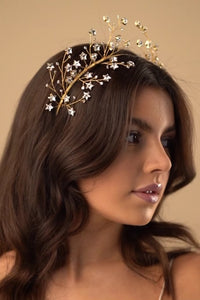 Gold star crown with matching hairpins extending over the top of the head