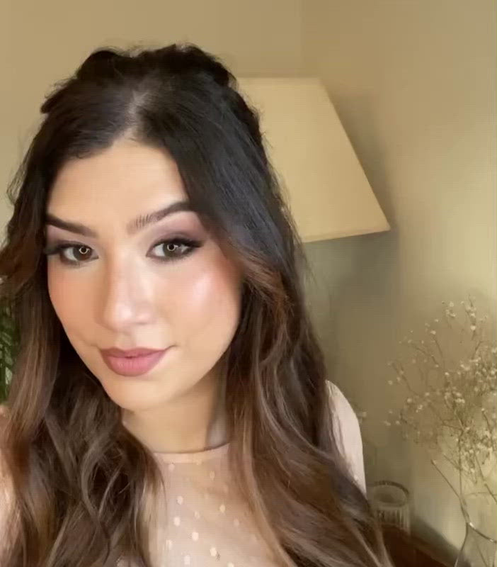 Video showing how to use a hair comb to hold a birdcage veil in place