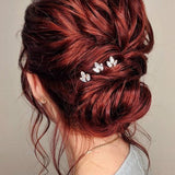 rose gold Swarovski crystal hairpins on red wedding hair bridal updo