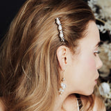 Swarovski star and pearl bridal hair comb worn to the side of the head