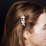 Gold Asteria Swarovski Crystal star and pearl cluster bridal comb worn to side of head
