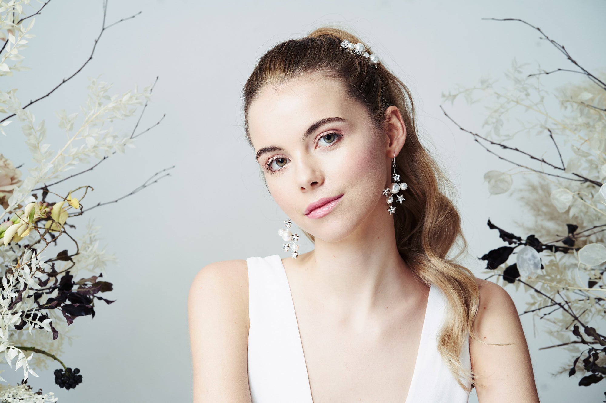 Celestial star and moon Swarovski crystal and pearl cluster wedding hair comb and earrings set - Asteria - worn with high ponytail