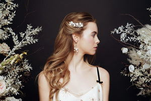 Celestial pearl and crystal star hair pins worn with matching wedding earrings